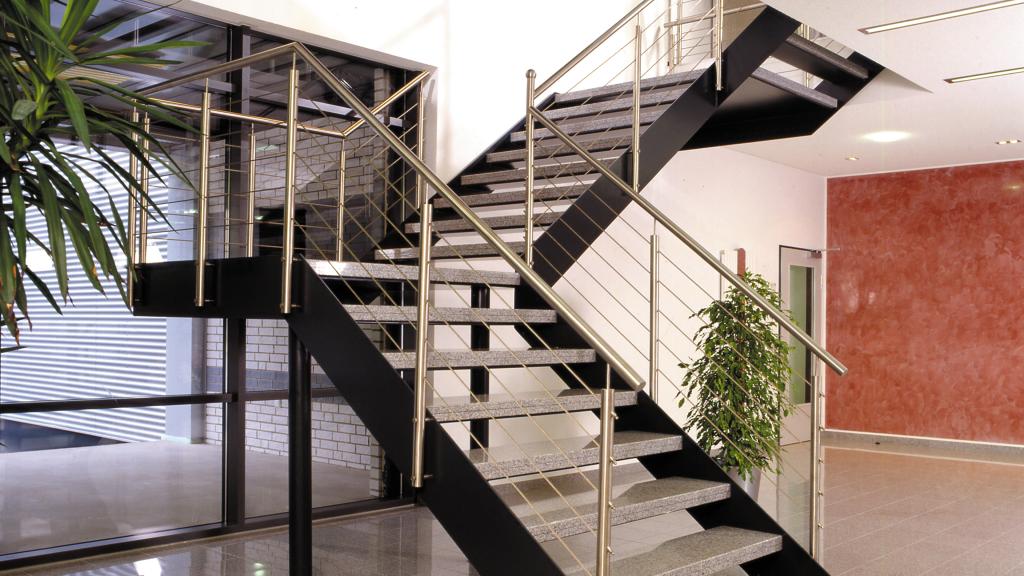 Staircase in the entrance area of the administrative building of SÄBU Morsbach GmbH